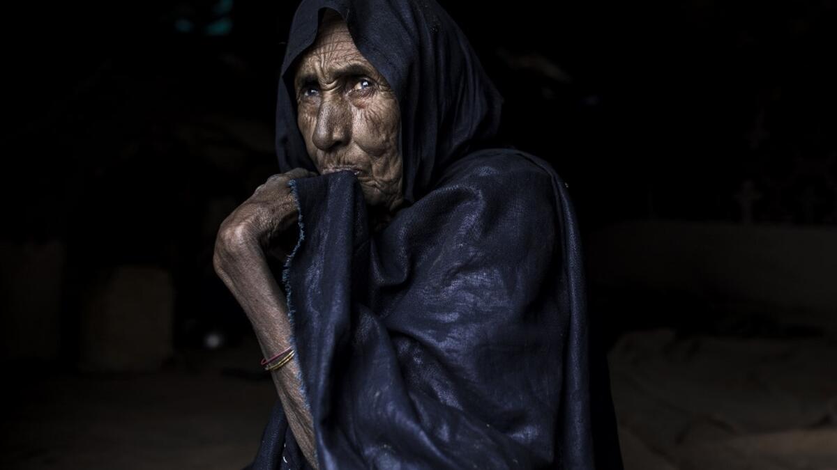 A woman from the small Nemadi(hunters) tribe in Eastern Mauritania is seen inside her families tent in the Loudeyatt Nemadi Camp on January 23, 2020. In the arid West African country of Mauritania, the way of life of the traditional group of hunters known as the Nemadi is slowly disappearing. JOHN WESSELS / AFP
