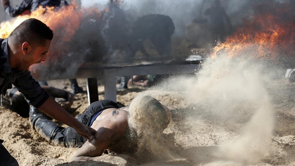 Palestinian police cadets take part in a training session at a police academy in Khan Yunis, in the southern Gaza Strip on February 6, 2020. MAHMUD HAMS / AFP
