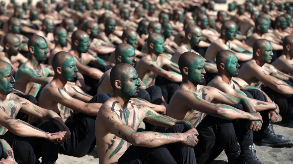 Palestinian police cadets take part in a training session at a police academy in Khan Yunis, in the southern Gaza Strip on February 6, 2020. MAHMUD HAMS / AFP