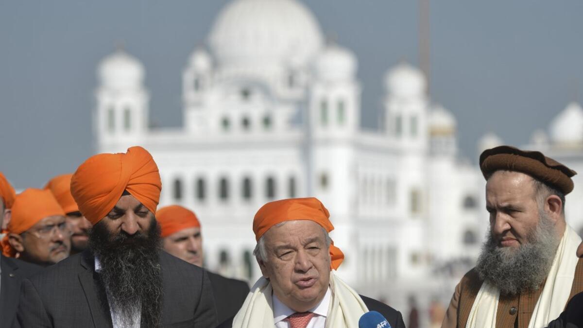 United Nations Secretary-General Antonio Guterres (C) speaks to the media during his visit the Sikh Shrine of Baba Guru Nanak Dev at Gurdwara Darbar Sahib in the Pakistani town of Kartarpur, near the Indian border, on February 18, 2020. Aamir QURESHI / AFP