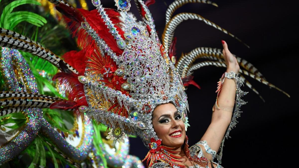 A participant presents her outfit during the Queen of the Carnival pageant contest in Santa Cruz de Tenerife, on the Spanish Canary island of Tenerife, on February 19, 2020. Gabriel BOUYS / AFP