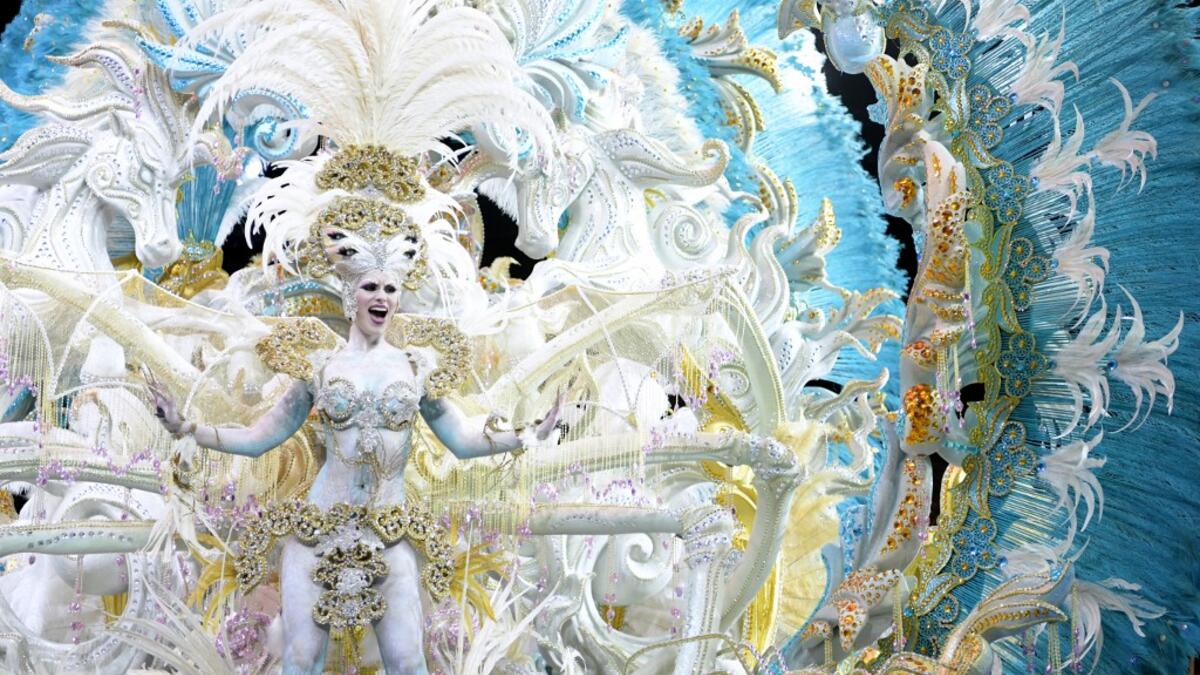 A participant presents her outfit during the Queen of the Carnival pageant contest in Santa Cruz de Tenerife, on the Spanish Canary island of Tenerife, on February 19, 2020. Gabriel BOUYS / AFP