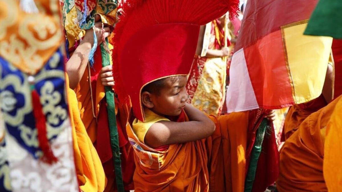 Exiled Tibetan performers sing and dance during celebrations marking the third day of the Lhosar Tibetan New Year in Kathmandu at the Boudhanath Stupa area (Twitter)
