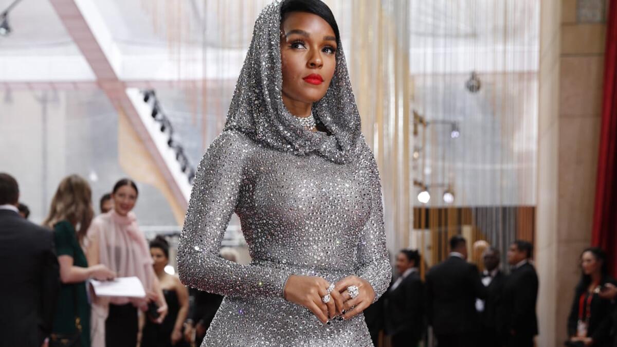 Janelle Monae dazzled in a glittering silver-hooded dress by Ralph Lauren