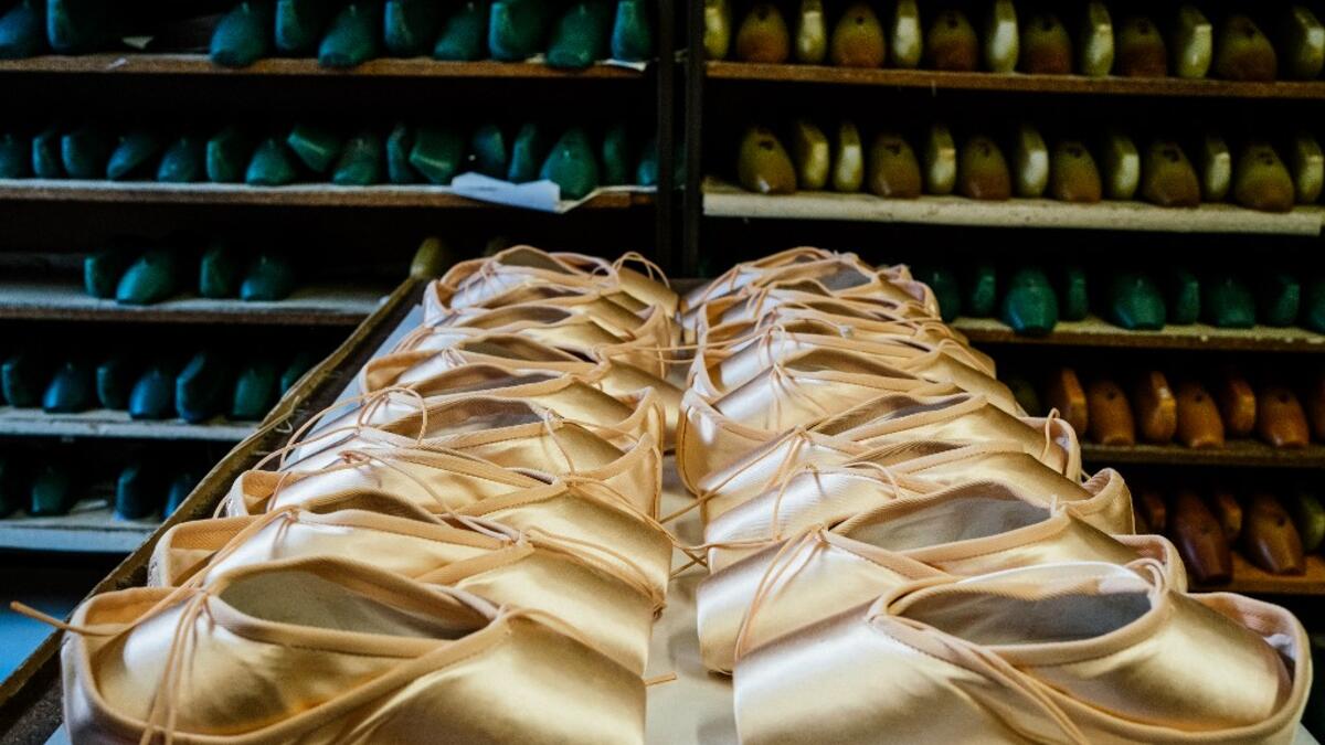 A picture taken at Grishko company shows pointe shoes in the company's Moscow workshop on February 25, 2020. Born in the chaos of the collapse of the Soviet Union, the Grishko family business has emerged among the top makers in the world of dance shoes, notably classic ballet pointe shoes, worn on the world's great stages. Dimitar DILKOFF / AFP