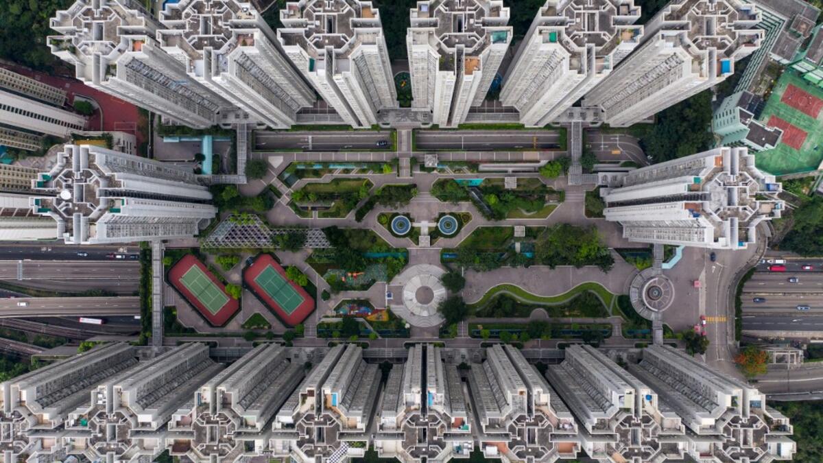 This aerial photograph taken on May 17, 2019 shows a housing estate in Hong Kong. DALE DE LA REY / AFP