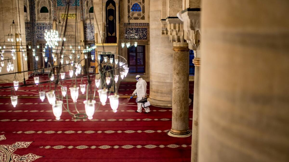 A member of the Istanbul's Municipality disinfects the Kilic Ali Pasa Mosque to prevent the spread of the COVID-19, the novel coronavirus, in Istanbul, on March 11, 2020. Turkey announced on March 11, 2020 its first coronavirus case, a man who had recently travelled to Europe and is in good health. Turkey has announced several measures in recent weeks to try and stop the virus reaching the country, including thermal cameras at airports, cancelling flights to affected countries and closing its border with Ir