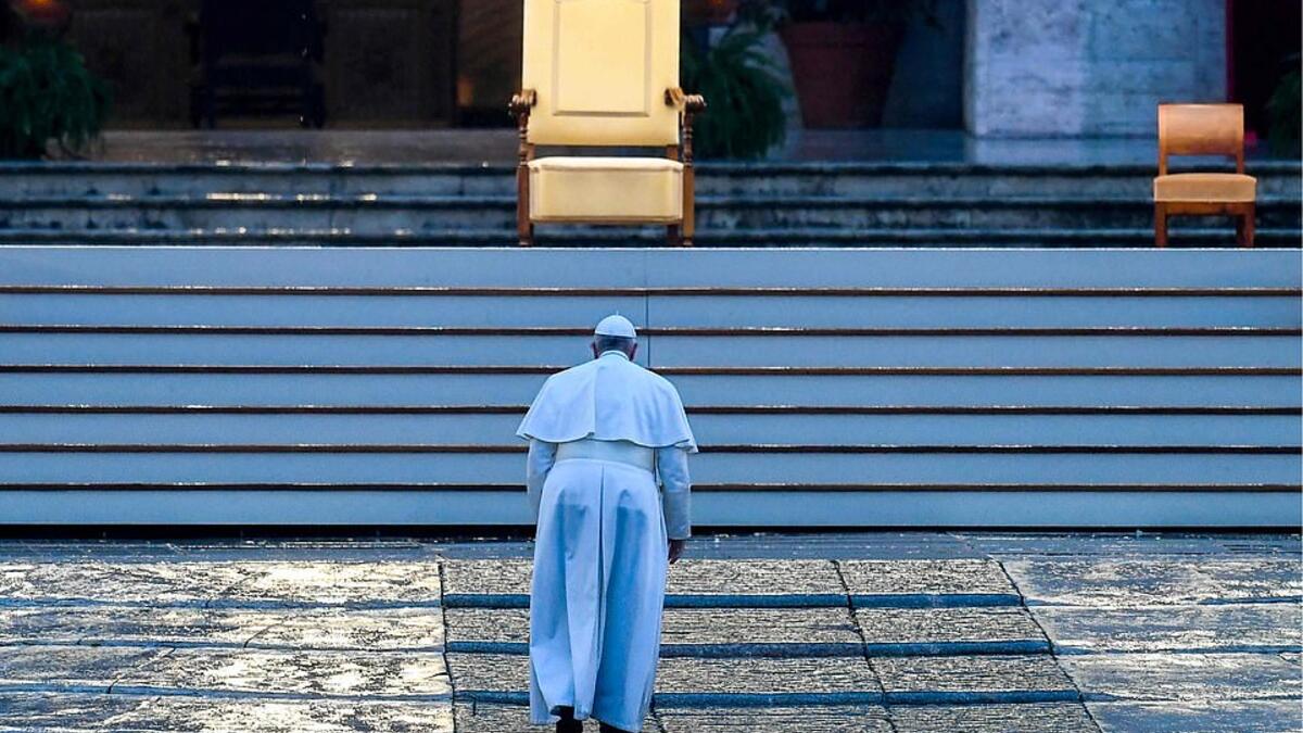 Pope Francis walked alone up the stairs to St Peter's Basilica to deliver the extraordinary 'Urbi et Orbi' blessing. (AFP/File)