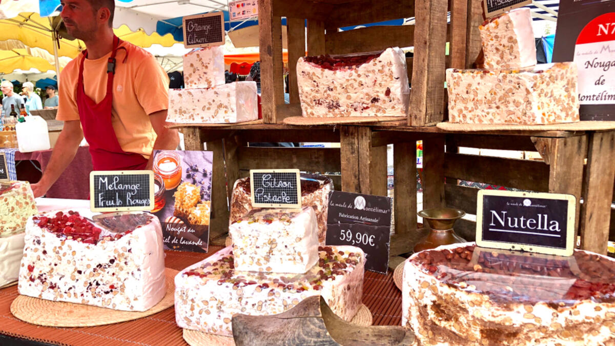 Market stall selling speciality and flavored nougat (Shutterstock)