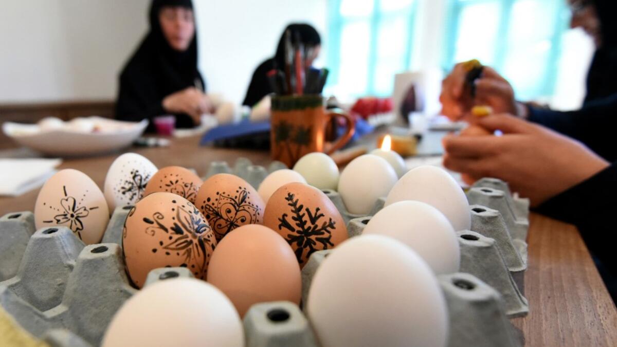 Orthodox Christian nuns decorate Easter eggs in a women’s Orthodox monastery near Danilovgrad west of capital Podgorica, on April 17, 2020. For the Orthodox Church in Montenegro, Easter 2020 falls on April 19. Savo PRELEVIC / AFP