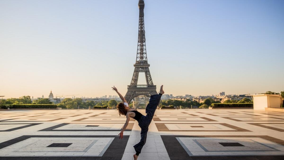 Syrian dancer and choreographer Yara al-Hasbani performs a dance on the empty Trocadero square in front of the Eiffel tower in Paris on April 22, 2020, on the 37th day of a strict lockdown in France to stop the spread of COVID-19 (novel coronavirus). Yara al-Hasbani was putting the finishing touches to her make-up for a performance of "Romeo and Juliet" in Damascus when she found out her father had been tortured to death. Sameer Al-DOUMY / AFP