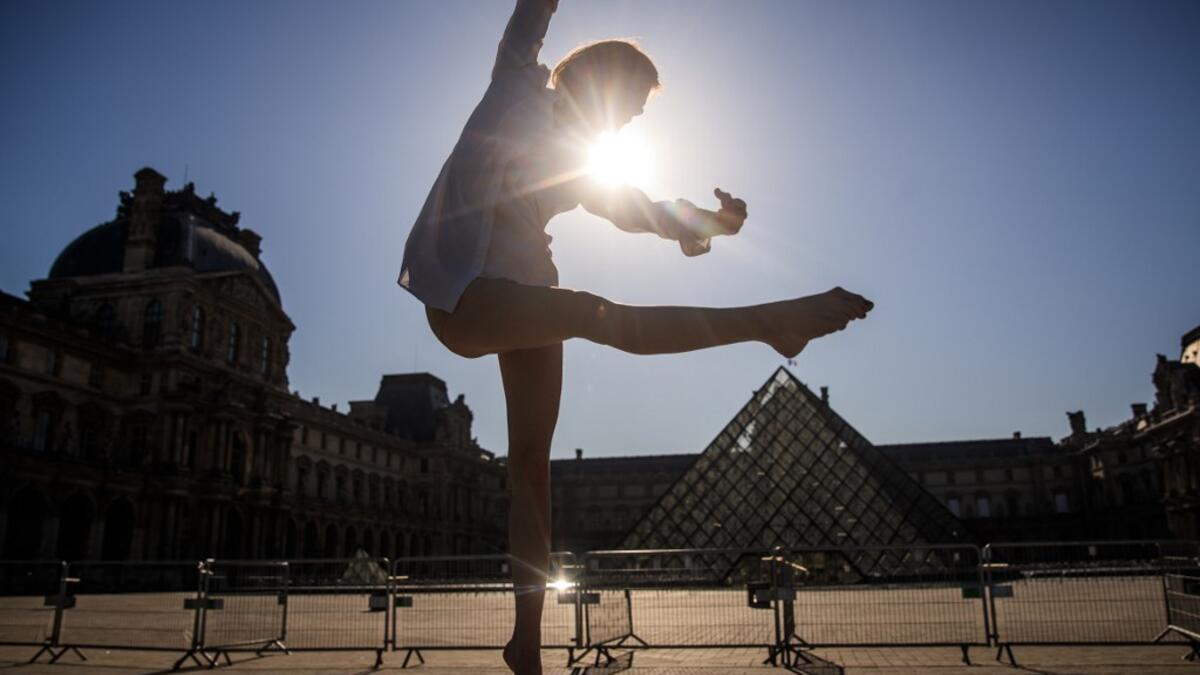 Syrian dancer and choreographer Yara al-Hasbani performs a dance on the empty Trocadero square in Paris on April 22, 2020. Sameer Al-DOUMY / AFP