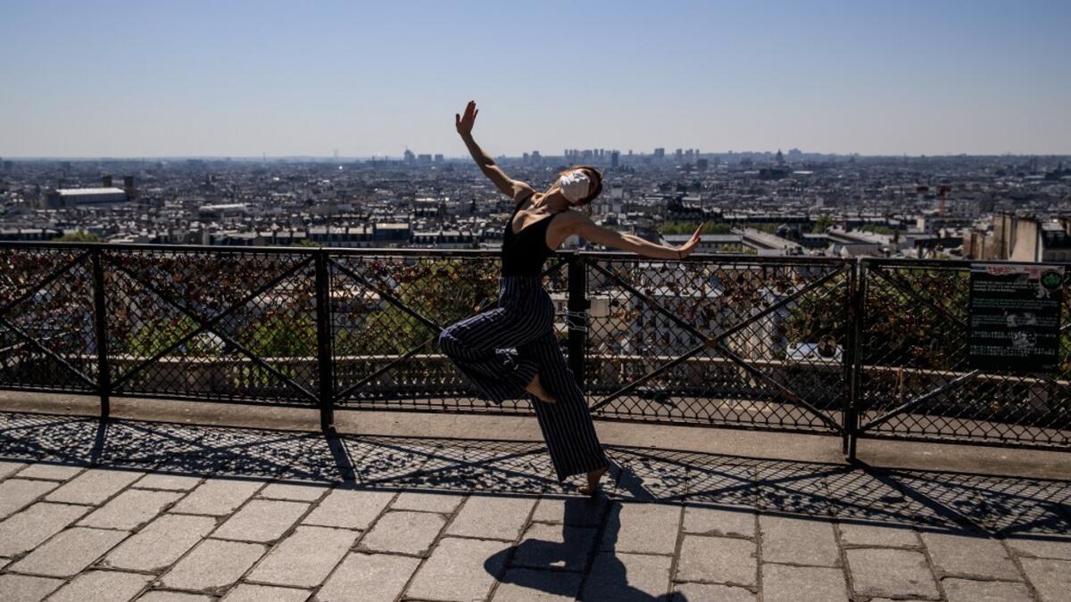 Syrian dancer and choreographer Yara al-Hasbani performs a dance on the empty Trocadero square in Paris on April 22, 2020. Sameer Al-DOUMY / AFP