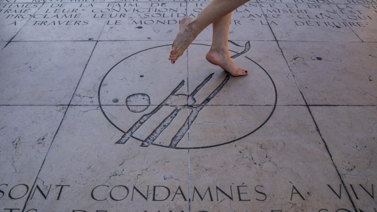 Syrian dancer and choreographer Yara al-Hasbani performs a dance on the empty Trocadero square in Paris on April 22, 2020. Sameer Al-DOUMY / AFP