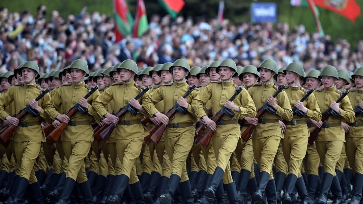 Belarus' servicemen wearing historical uniforms take part in a military parade to mark the 75th anniversary of the Soviet Union's victory over Nazi Germany in World War Two, in Minsk on May 9, 2020. Sergei GAPON / AFP