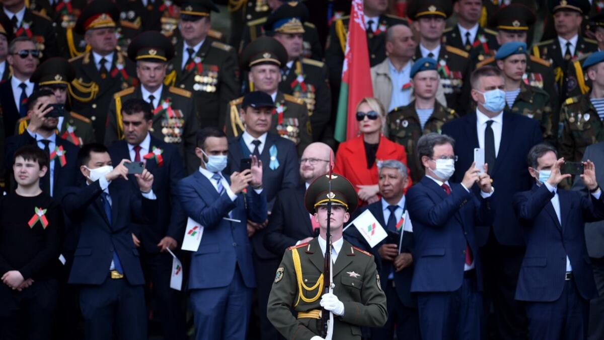Guests attend a military parade to mark the 75th anniversary of the Soviet Union's victory over Nazi Germany in World War Two, in Minsk on May 9, 2020. Sergei GAPON / AFP