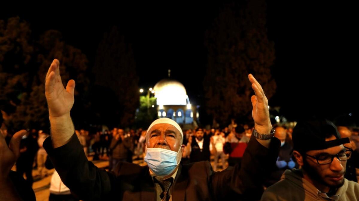 Palestinian Muslim worshippers pray at the al-Aqsa mosque compound, in Jerusalem's Old City on May 31, 2020, after a two-month closure due to the COVID-19 pandemic. Ahmad GHARABLI / AFP