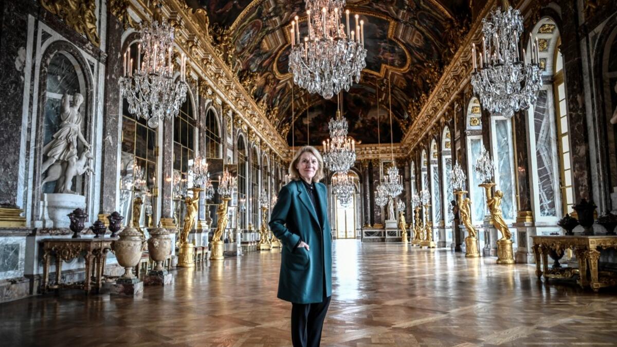 President of the Palace of Versailles (Chateau de Versailles) Catherine Pegard poses at the Galerie des Glaces (Hall of Mirrors) at the Chateau de Versailles (Palace of Versailles) in Versailles near Paris, on June 5, 2020, on the eve of it re-opening after 82 days of closure due to the novel coronavirus (COVID-19) outbreak. The Palace of Versailles -- France's big tourist attraction with nearly 10 million tourists a year - will open on June 6 with no US or Asia tourists who represent 30% of its visitors. S