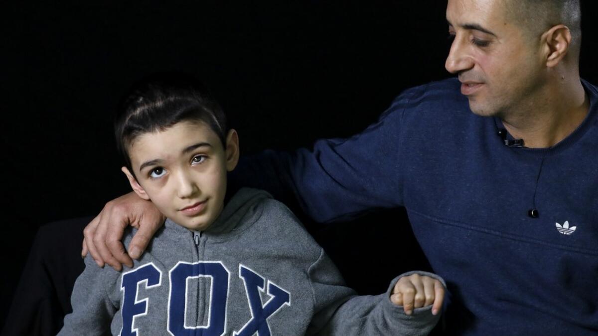 This combination of pictures created on June 8, 2020, shows (top L to R) Ahmed al-Louth, who lost his left eye, posing during a photo session in Bureij refugee camp in central Gaza; Muath Amarneh, who lost his left eye, posing during a photo session in Ramallah; Mohammed Burqan, who lost his right eye, posing during a photo session in Jerusalem; (middle L to R) Jacqueline Shahada, who lost her left eye, posing during a photo session in Bureij refugee camp in central Gaza; Malek Issa, 9, lost his left eye