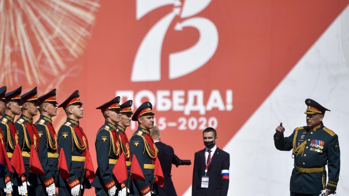 Russian honour guards get ready for a military parade, which marks the 75th anniversary of the Soviet victory over Nazi Germany in World War Two, at Red Square in Moscow on June 24, 2020. The parade, usually held on May 9, was postponed this year because of the coronavirus pandemic. Alexander NEMENOV / AFP
