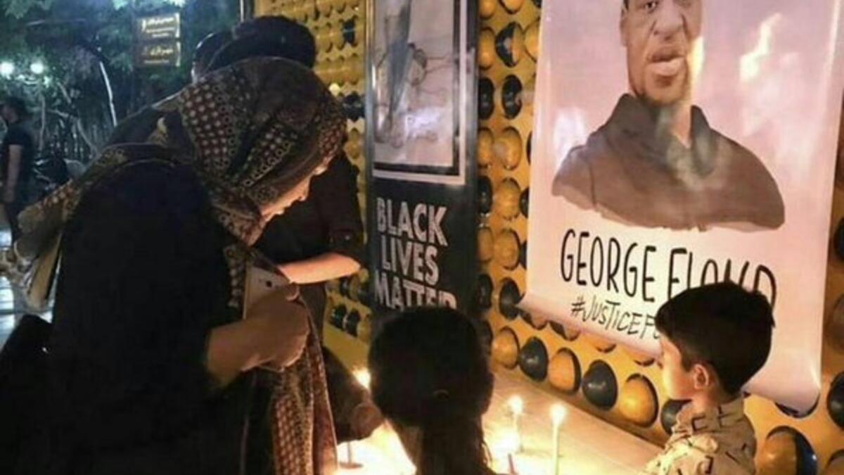 Iranians hold a vigil in memory of George Floyd in Tehran, Iran (Twitter)