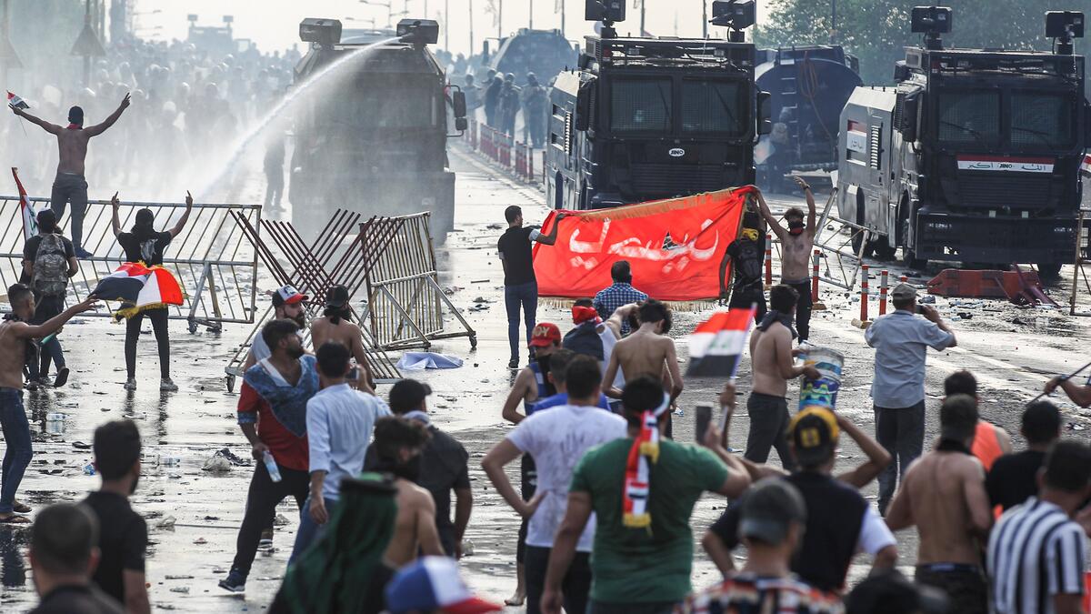 Security forces have used water cannons and tear gas to disperse more than 1,000 protesters in central Baghdad. Iraq is considered the 12th most corrupt country in the world according to Transparency International. Power cuts are rampant, water shortages are common and unemployment is high, particularly among youth. (Ahmad Al-Rubaye/ AFP)