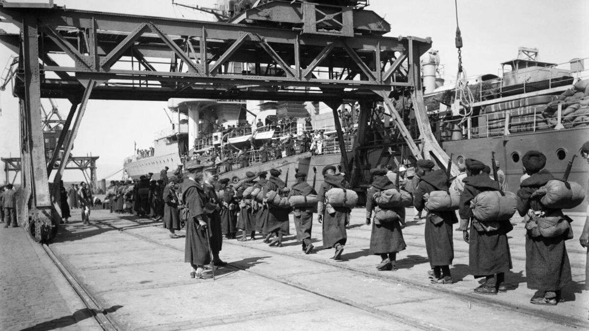 Moroccan goumiers (indigenous Moroccan soldiers who served in the French Army) parade on the docks, in October 1945, after disembarking the the French Navy light cruiser Duguay-Trouin in the port of Tangiers. AFP