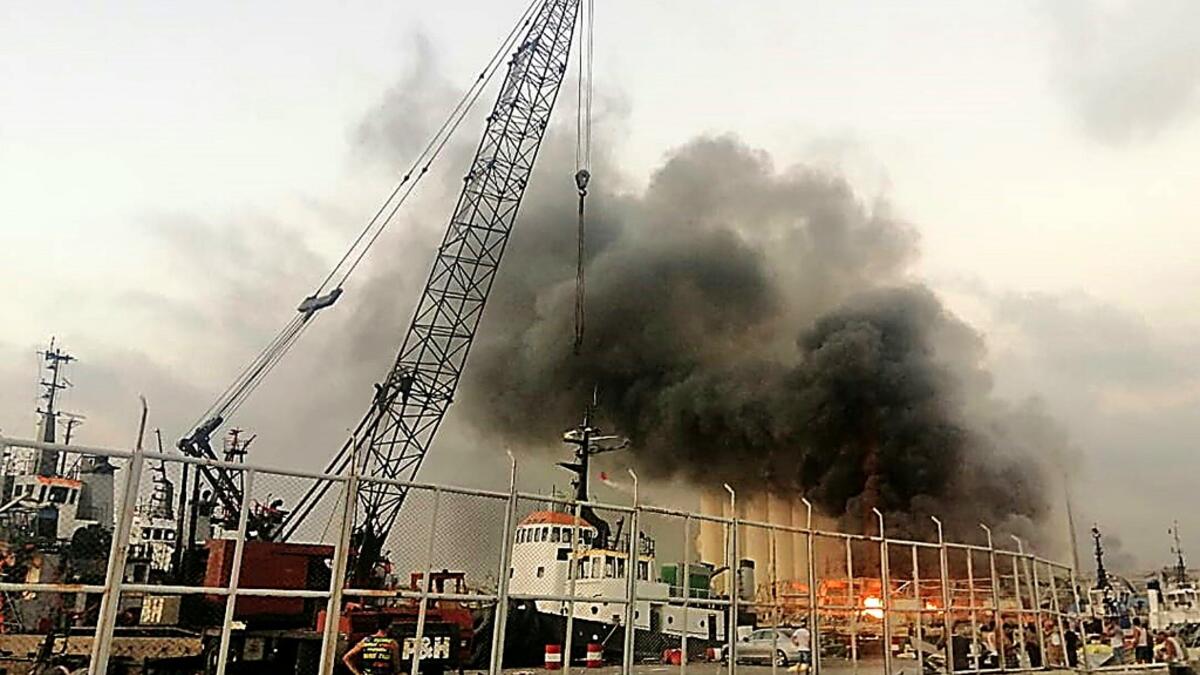 Lebanese media carried images of people trapped under rubble, some bloodied, after the massive explosions, the cause of which was not immediately known.  Layal ABOU RAHAL / AFP