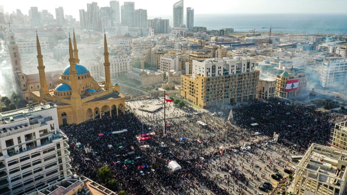 This picture taken on August 8, 2020 shows an aerial view of clashes between demonstrators and security forces, in downtown Beirut on August 8, 2020, following a demonstration against a political leadership they blame for a monster explosion that killed more than 150 people and disfigured the capital Beirut. AFP