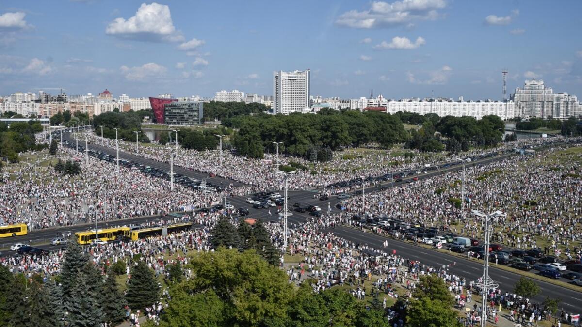 Belarus opposition supporters attend a rally in central Minsk on August 16, 2020. The Belarusian strongman, who has ruled his ex-Soviet country with an iron grip since 1994, is under increasing pressure from the streets and abroad over his claim to have won re-election on August 9, with 80 percent of the vote. Sergei GAPON / AFP