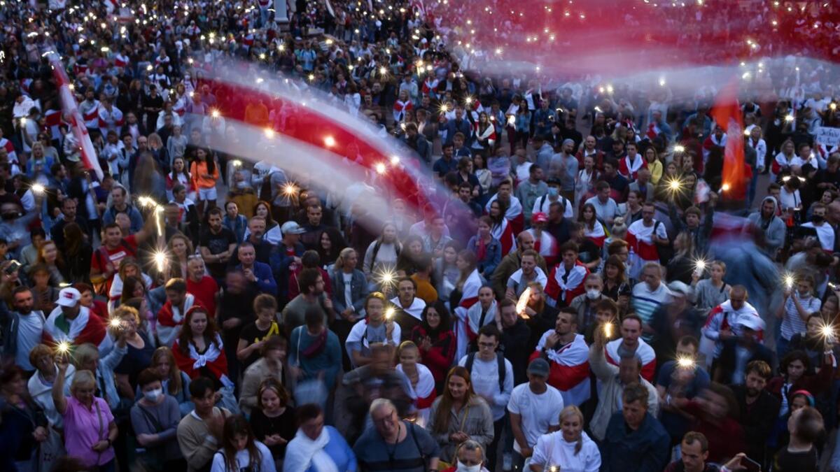 Opposition supporters rally to protest against disputed presidential elections results on Independence Square in Minsk on August 20, 2020. Sergei GAPON / AFP