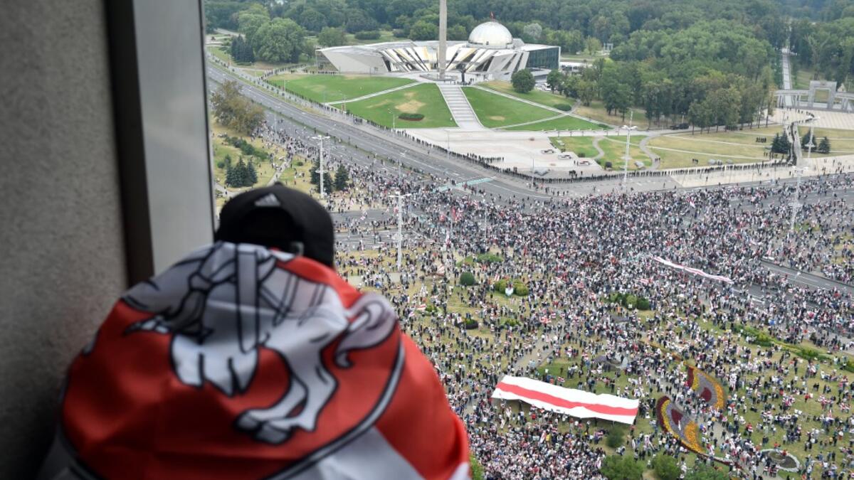 Opposition supporters rally to protest against disputed presidential elections results in Minsk on August 23, 2020. Tens of thousands of demonstrators massed in central Minsk on August 23 to demand the resignation of Belarusian President Alexander Lukashenko, the latest in a wave of protests against his disputed re-election. Sergei GAPON / AFP