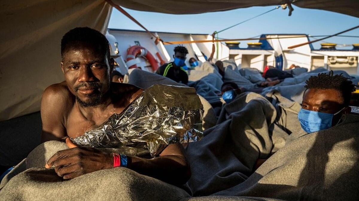 Appealing for help, Lea Reisner, head of operations for the Louise Michel, said: 'The people have sat in a mix of salt water and fuel for days' (AFP)
