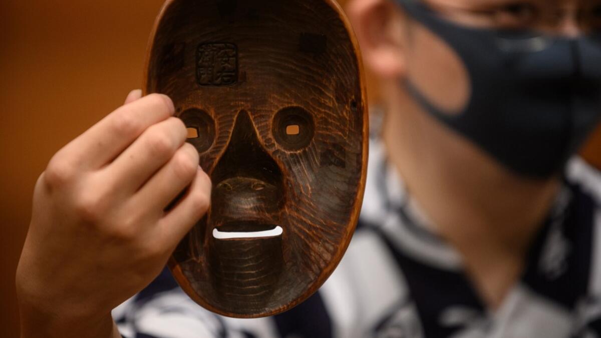 The COVID-19 coronavirus pandemic has affected theatres across the world, but noh performers now face the ultimate question -- can the play that has been passed down for generations since the 14th century still survive after the pandemic? Philip FONG / AFP