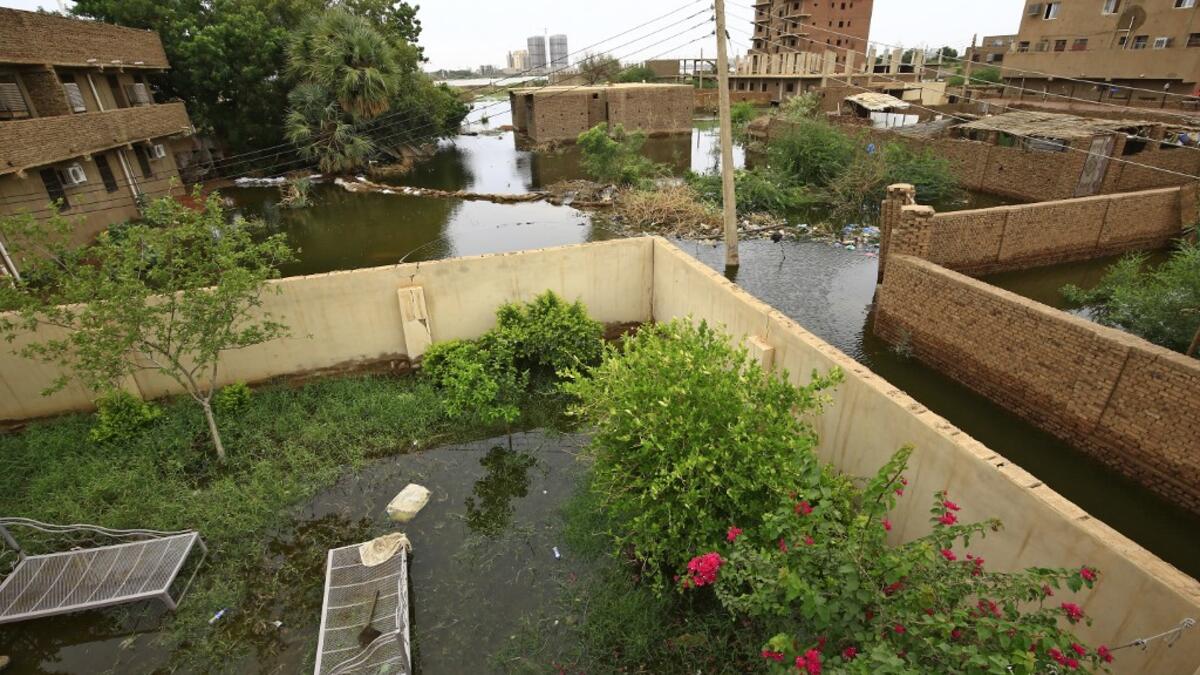 Officials say that across Sudan seasonal floods have killed 94 people, injured 46 and destroyed or damaged over 60,000 homes, with the river level rising to 17.43 metres (57 feet feet). ASHRAF SHAZLY / AFP