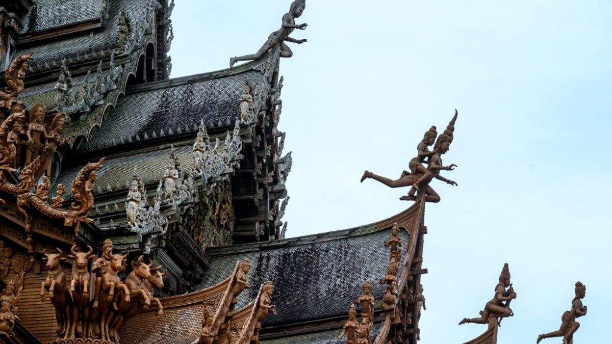 Inspired by the Thai temples in Ayutthaya, the building was designed by Thai businessman Lek Viriyaphan and is decorated with ornamentation from the Thai, Hindu, Buddhist, Chinese, and Khmer traditions. The construction started in 1981 and is not expected to be finished until 2025. Mladen ANTONOV / AFP