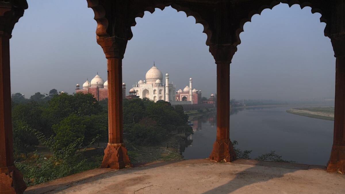 A view of the Taj Mahal is pictured in Agra on September 21, 2020. India's famed Taj Mahal and some schools reopened on September 21 as authorities pressed ahead with kickstarting the nation’s coronavirus-battered economy despite soaring infection numbers. Sajjad HUSSAIN / AFP
