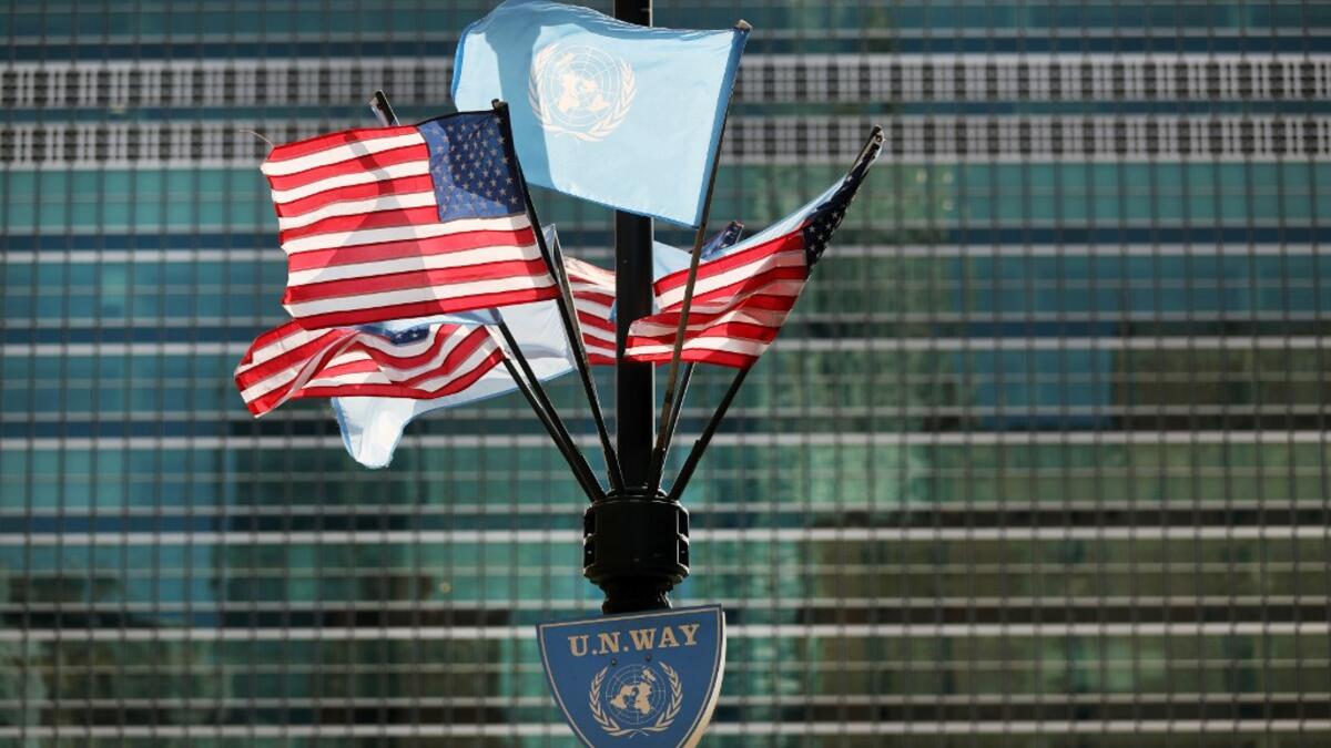 American and United Nations flags fly across from the United Nations in Manhattan on the first official day of the 75th United Nations General Assembly on September 22, 2020 in New York City. Due to the ongoing COVID-19 pandemic, this year's gathering is mostly being held remotely with world leaders making speeches and appearances by video link. Spencer Platt/Getty Images/AFP SPENCER PLATT / GETTY IMAGES NORTH AMERICA / Getty Images via AFP