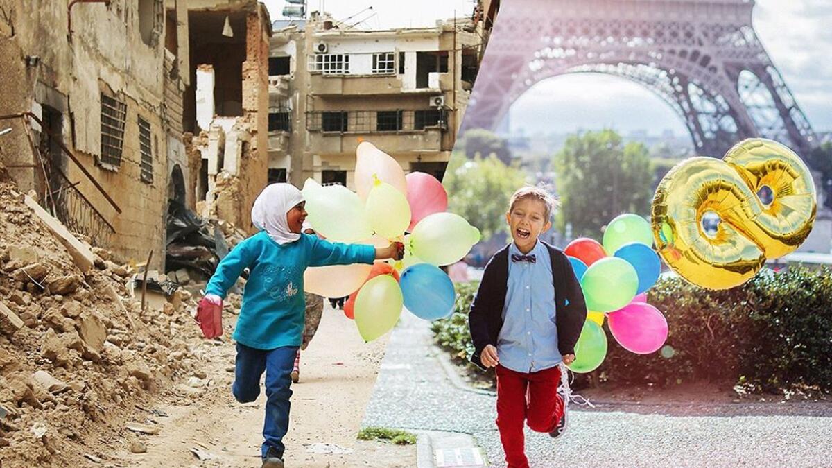 Syrian children run with balloons past heavily damaged buildings in the neighbourhood of Jobar, on the eastern outskirts of the Syrian capital Damascus on April 9, 2016. (ugurgallen/ Instagram)