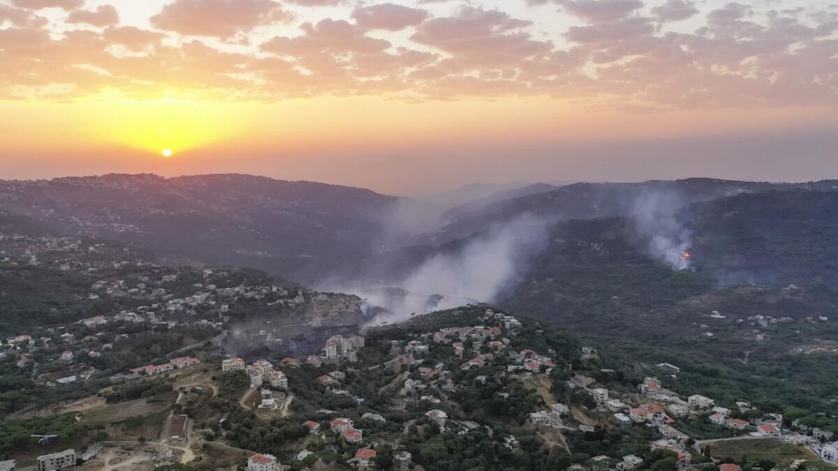 An aerial picture shows smoke billowing from a forest fire in Lebanon's Ras El Metn area, on October 10, 2020. AFP