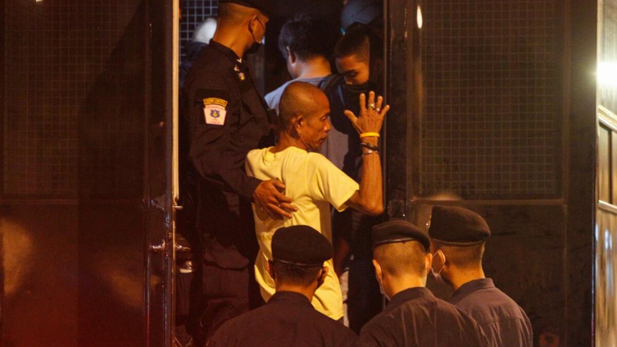 A pro-democracy protester is arrested by police in Bangkok on October 15, 2020, after the government declared a state of emergency following an anti-government rally the previous day. STR / AFP