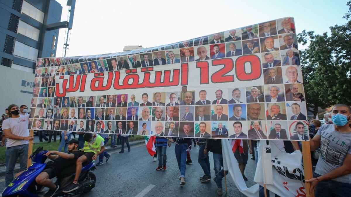 Hundreds marched in Lebanon's capital to mark the first anniversary of a non-sectarian protest movement that has rocked the political elite but has yet to achieve its goal of sweeping reform. ANWAR AMRO / AFP