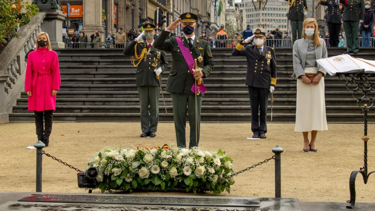 King Philippe - Filip of Belgium (front), Defence Minister Ludivine Dedonder (R), and Interior Minister Annelies Verlinden (L) attend a ceremony at the Tomb of the Unknown Soldier monument in Brussels on November 11, 2020, as part of the commemorations marking the 102nd anniversary of the November 11, 1918 Armistice, ending World War I (WWI). Olivier MATTHYS / BELGA / AFP