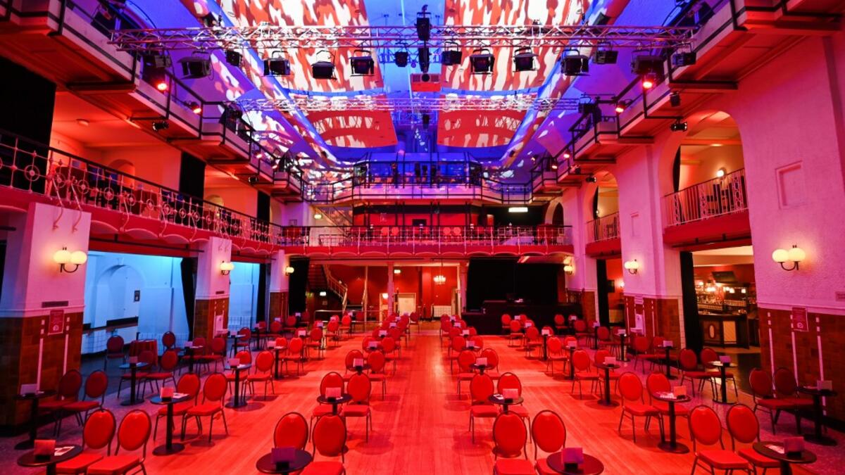 A picture taken on November 20, 2020 shows empty seats at the Ebertbad theater in Oberhausen, western Germany. The Ebertbad was built in 1894/95 as one of the first public baths in the German Empire and now serves as a theater with 450 seats. No public events will take place at theaters until December, 2020 to limit the spread of the novel coronavirus. Ina FASSBENDER / AFP