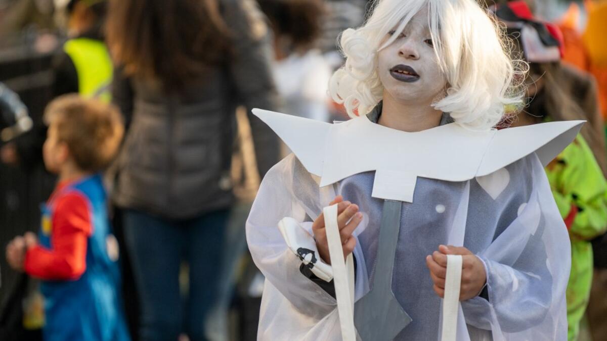A child in costume for Halloween in Woodlawn Heights on October 31, 2020 in New York City. The CDC shared on their website alternative ways to still celebrate the holiday while being safe. David Dee Delgado/Getty Images/AFP