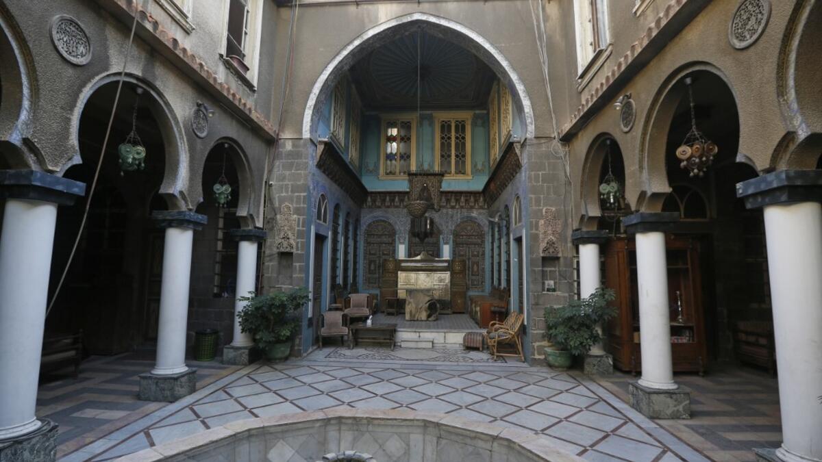 A view shows the courtyard of Naasan palace, a historical landmark, in the old part of Syria's capital Damascus on November 18, 2020. The old city of the Syrian capital is famed for its elegant century-old houses, usually two storeys built around a leafy rectangular courtyard with a carved stone fountain at its centre. While the capital has been largely spared the violence of Syria's almost ten-year war, several of these traditional homes have been abandoned by their owners or damaged in the conflict. AFP