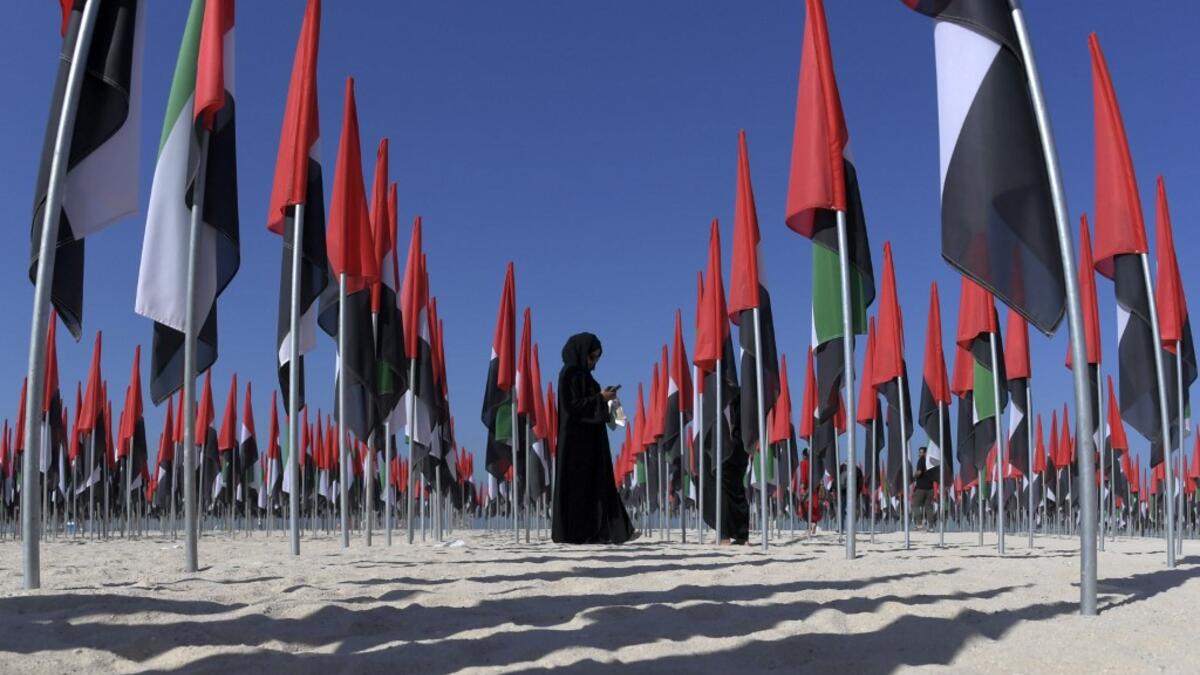 Emiratis attend celebrations of UAE's national day on December 2, 2020. Karim SAHIB / AFP