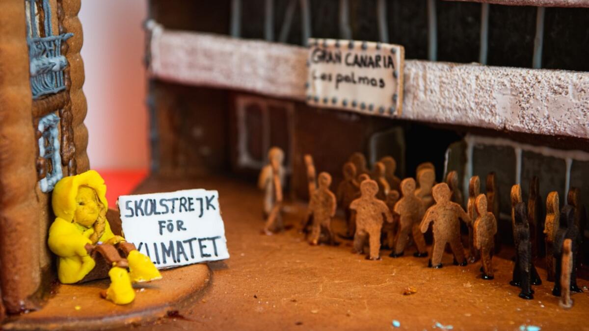 A gingerbread model with the shape of Swedish climate activist Greta Thunberg, is pictured at the ArkDes, Sweden’s national centre for architecture and design, during this year's Gingerbread House 2020 competition with the theme 'Distance', on December 7, 2020 in Stockholm, Sweden. Jonathan NACKSTRAND / AFP