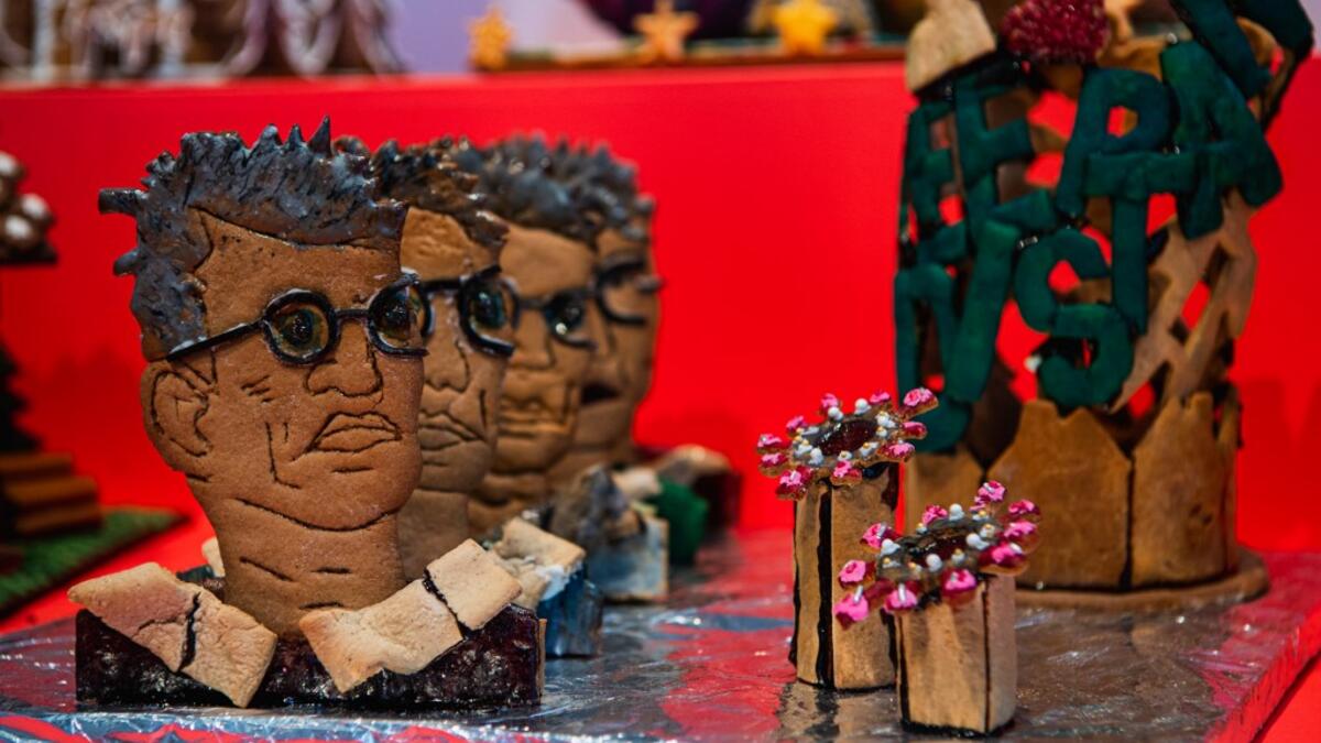 A gingerbread model with the shape of Sweden's state epidemiologist Anders Tegnell, is pictured at the ArkDes, Sweden’s national centre for architecture and design, during this year's Gingerbread House 2020 competition with the theme 'Distance', on December 7, 2020 in Stockholm, Sweden. Jonathan NACKSTRAND / AFP