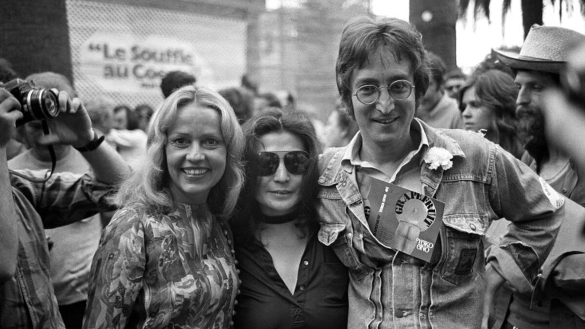 John Lennon and wife Yoko Ono at the Cannes Film Festival in 1971 / © AFP/File